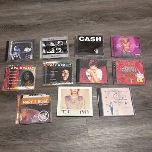 CD Collection LOT OF 11 CD’s Taylor Swift Bob Marley Sinatra Santana Cash